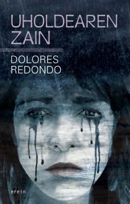 Dolores Redondo: Uholdearen zain (Paperback, Euskara language, Erein)